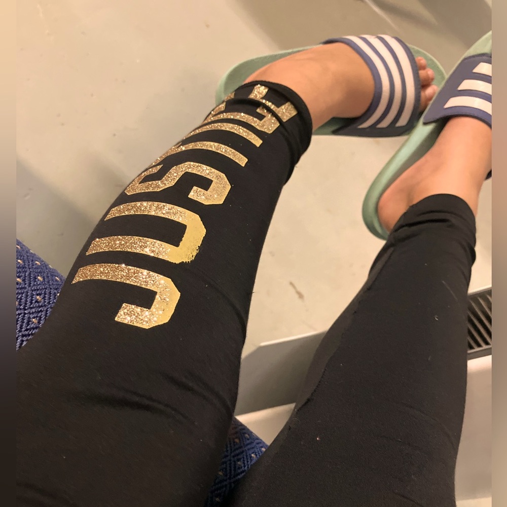 Black legging with gold justice words